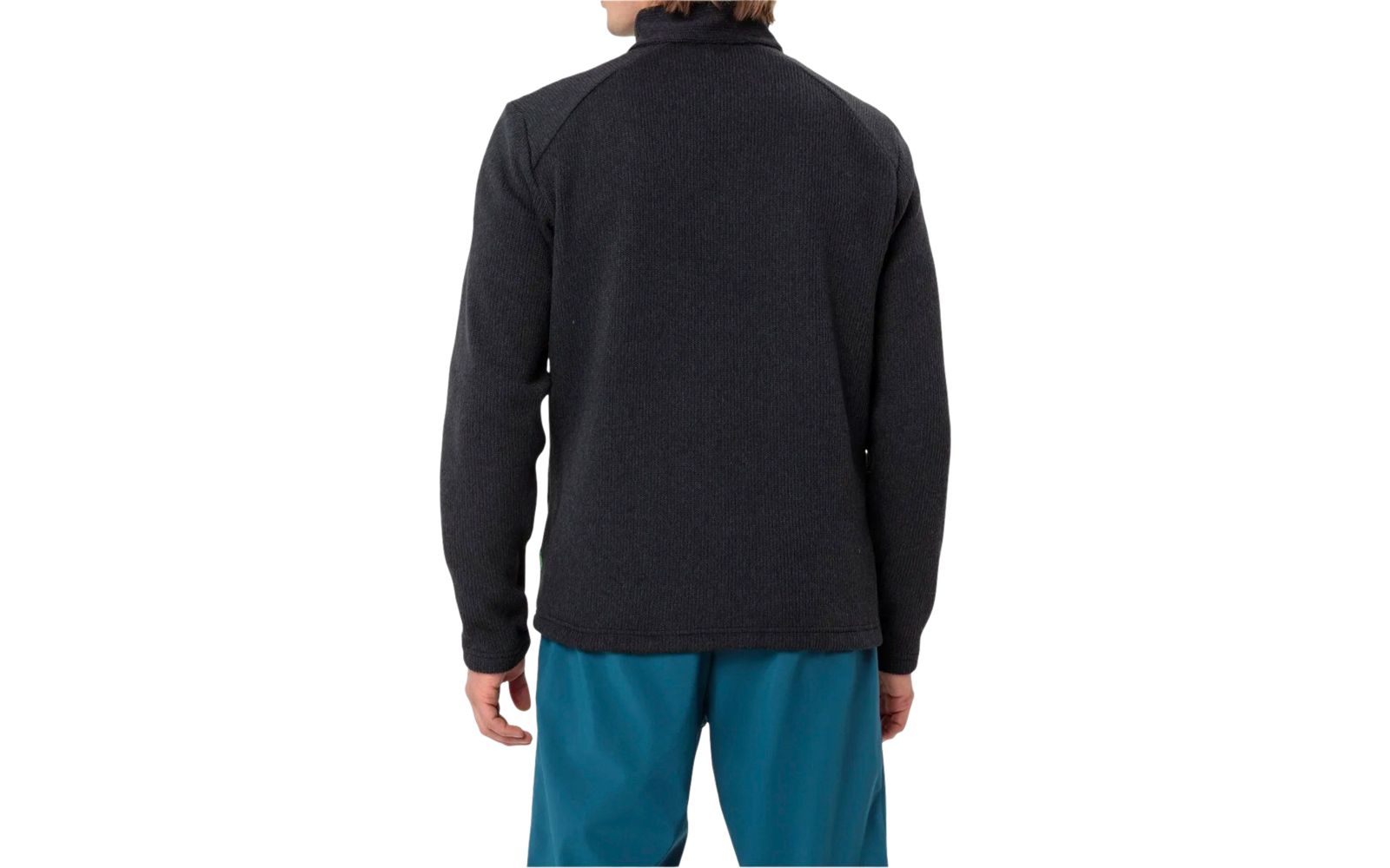 Rückansicht einer Person mit schwarzem Pullover und blauen Hosen