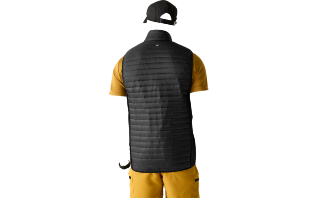 Person shown from behind wearing a black quilted vest, yellow short-sleeve shirt, yellow pants, black cap and wristwatch, plain light background