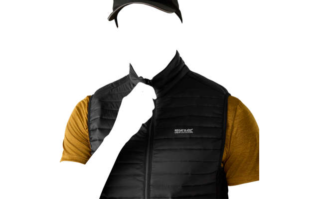 Person wearing a black baseball cap, black quilted vest with Regatta logo and yellow t-shirt, pulling the zipper