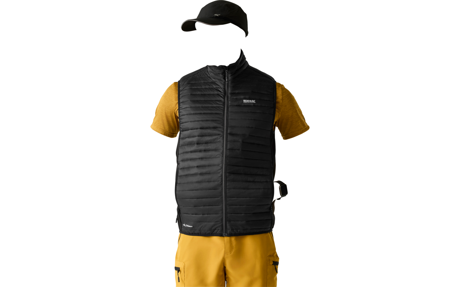 Person standing against a light background wearing a black quilted zip vest, yellow T‑shirt, yellow cargo pants, black cap and wristwatch; hands in pockets