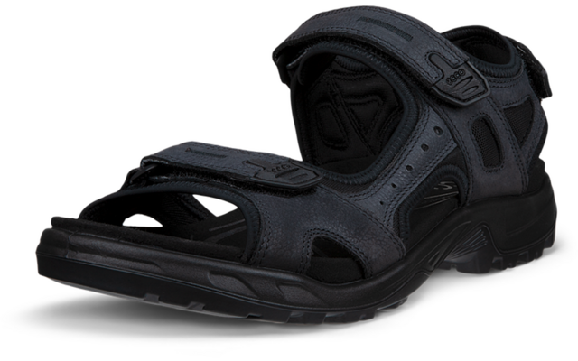 une sandale noire ouverte avec deux bandes auto-agrippantes et une semelle crantée