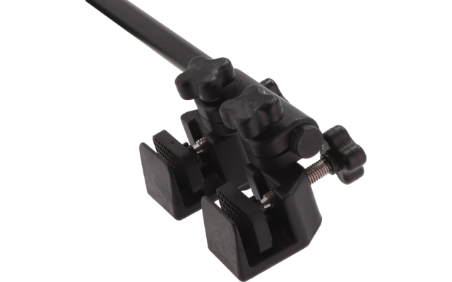 Schwarzes, technisches Bauteil mit mehreren Knöpfen und Verbindungen