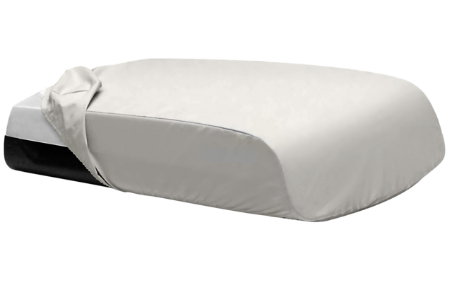 Almohada blanca contorneada con funda blanca parcialmente retirada, espuma negra visible en un lado