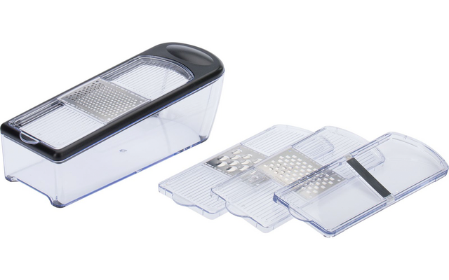 Boîte rectangulaire transparente en plastique avec couvercle à bord noir ; à côté deux inserts transparents avec surfaces métalliques de râpage et de tranchage