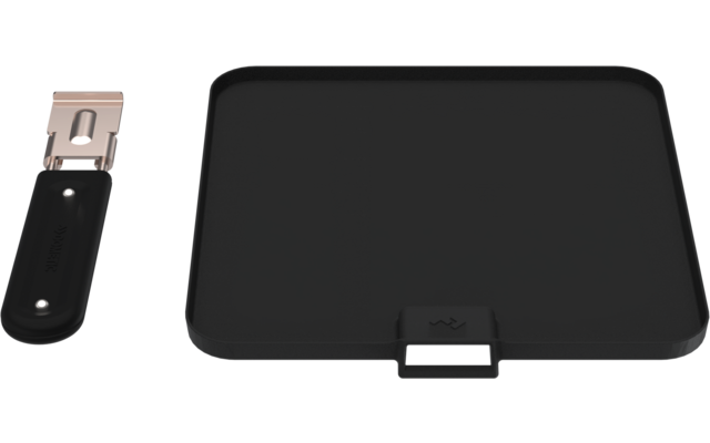 Black flat rectangular object with rounded corners and a small port on the front; next to it a black USB plug with metal connector