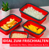Vier rote, rechteckige Behälter mit weißem Reis, Apfelscheiben, gelben Fruchtscheiben und Haferflocken; kleine Sukkulenten-Pflanze; rotes Banner mit Text „IDEAL ZUM FRISCHHALTEN – perfekt für Reis, Obst Gemüse & Co.“
