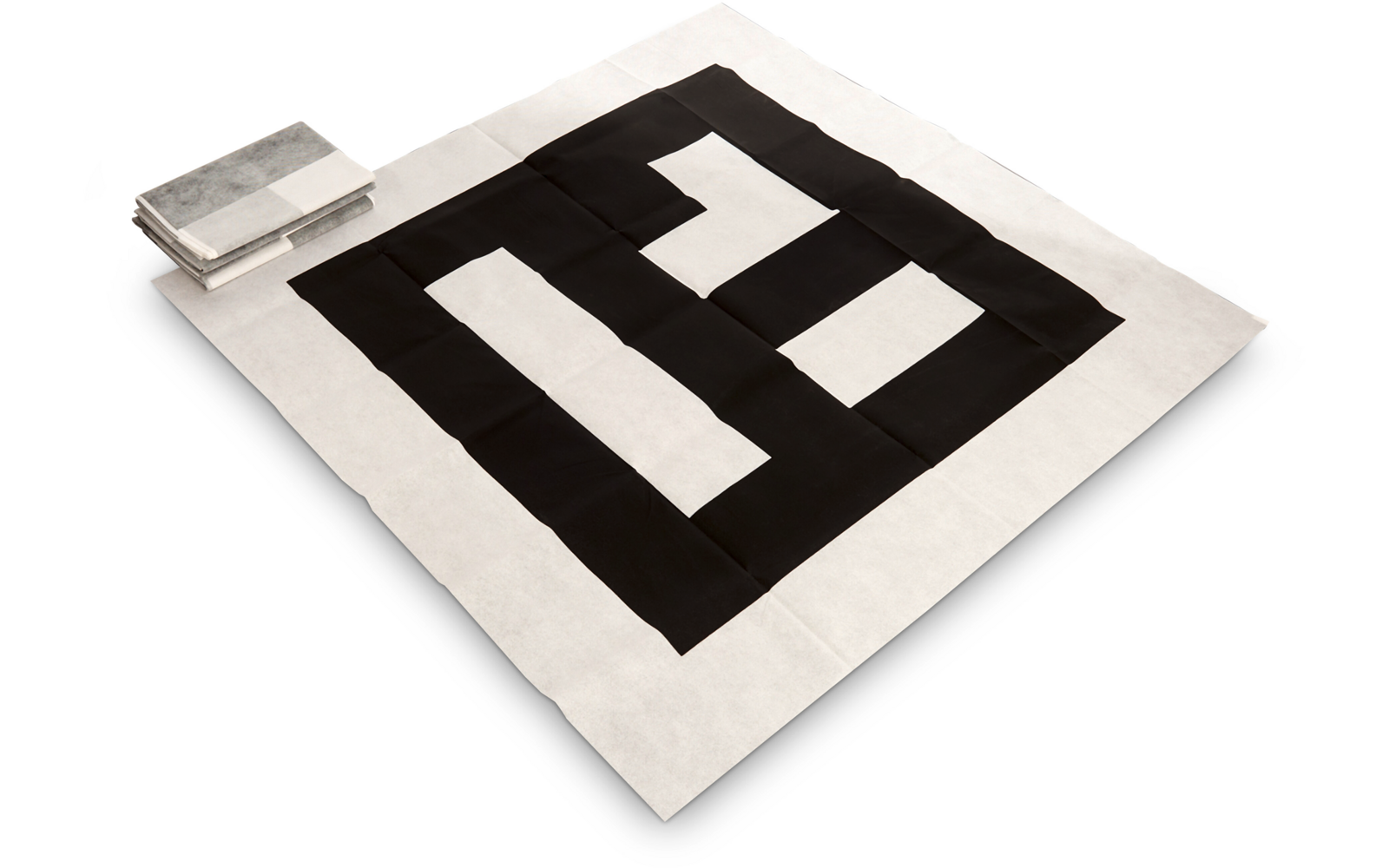 Ein aufgeschlagenes Buch mit einem Schwarz-Weiß-Muster auf der Seite