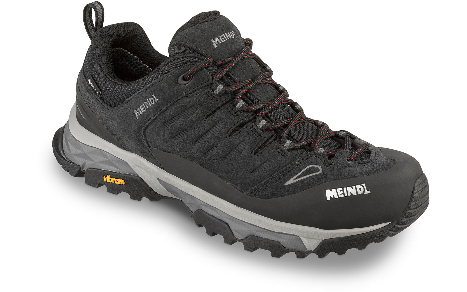 Scarpa nera con lacci neri con dettagli rossi, suola scolpita grigia, logo MEINDL sulla parte anteriore ed etichetta Vibram sulla suola su sfondo bianco