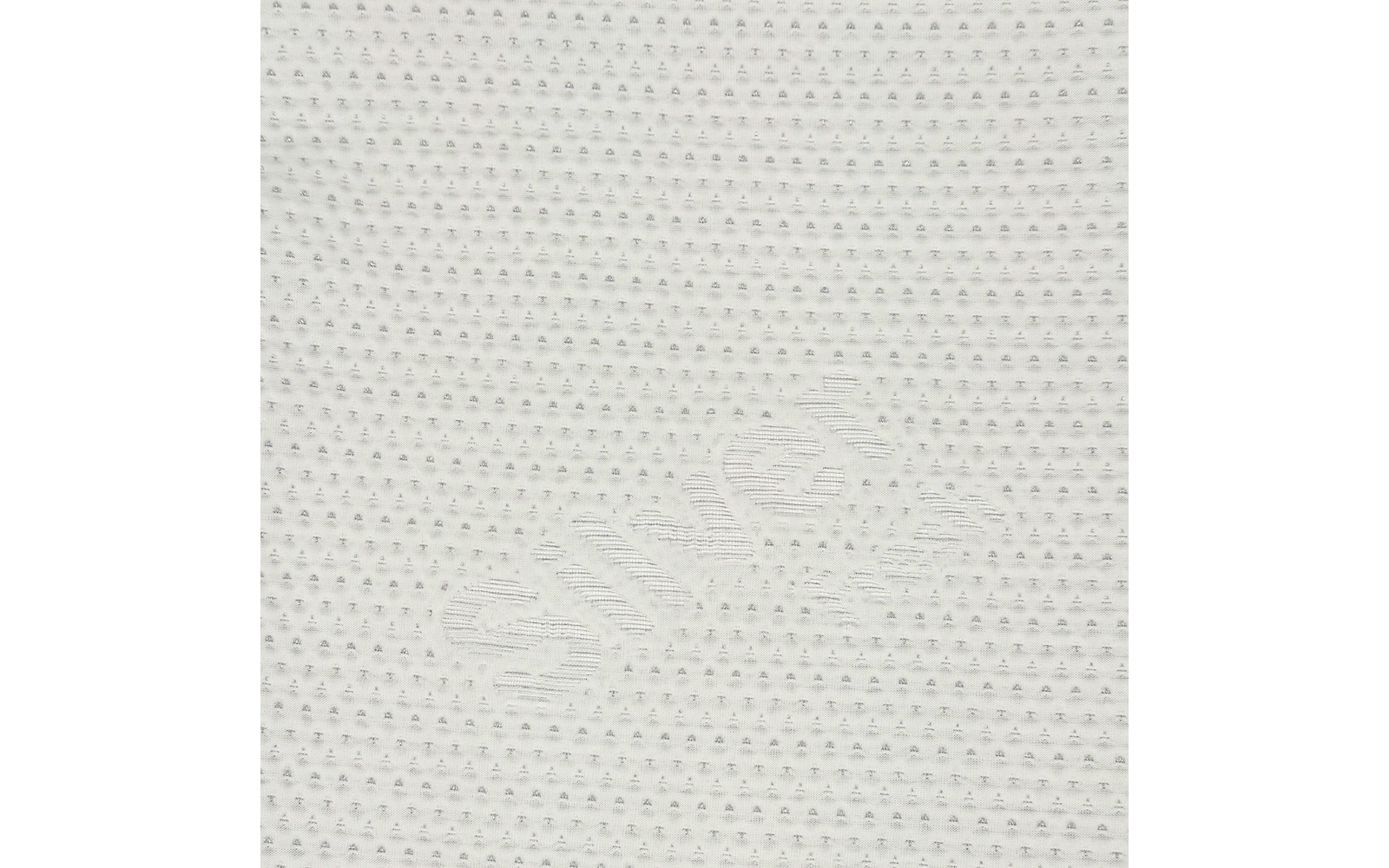 Close-up van een witte, gestructureerde oppervlakte met kleine, regelmatige verhoogde puntjes en een vervaagde, onleesbare reliëfopdruk