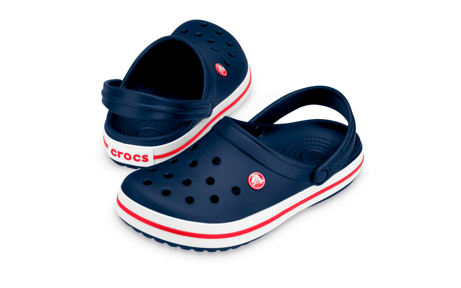 Dunkelblaues Paar Clogs mit Belüftungsöffnungen, verstellbaren Fersenriemen, weißer Sohle mit rotem Streifen, Markenaufdruck an der Ferse und rundem Logo an der Außenseite