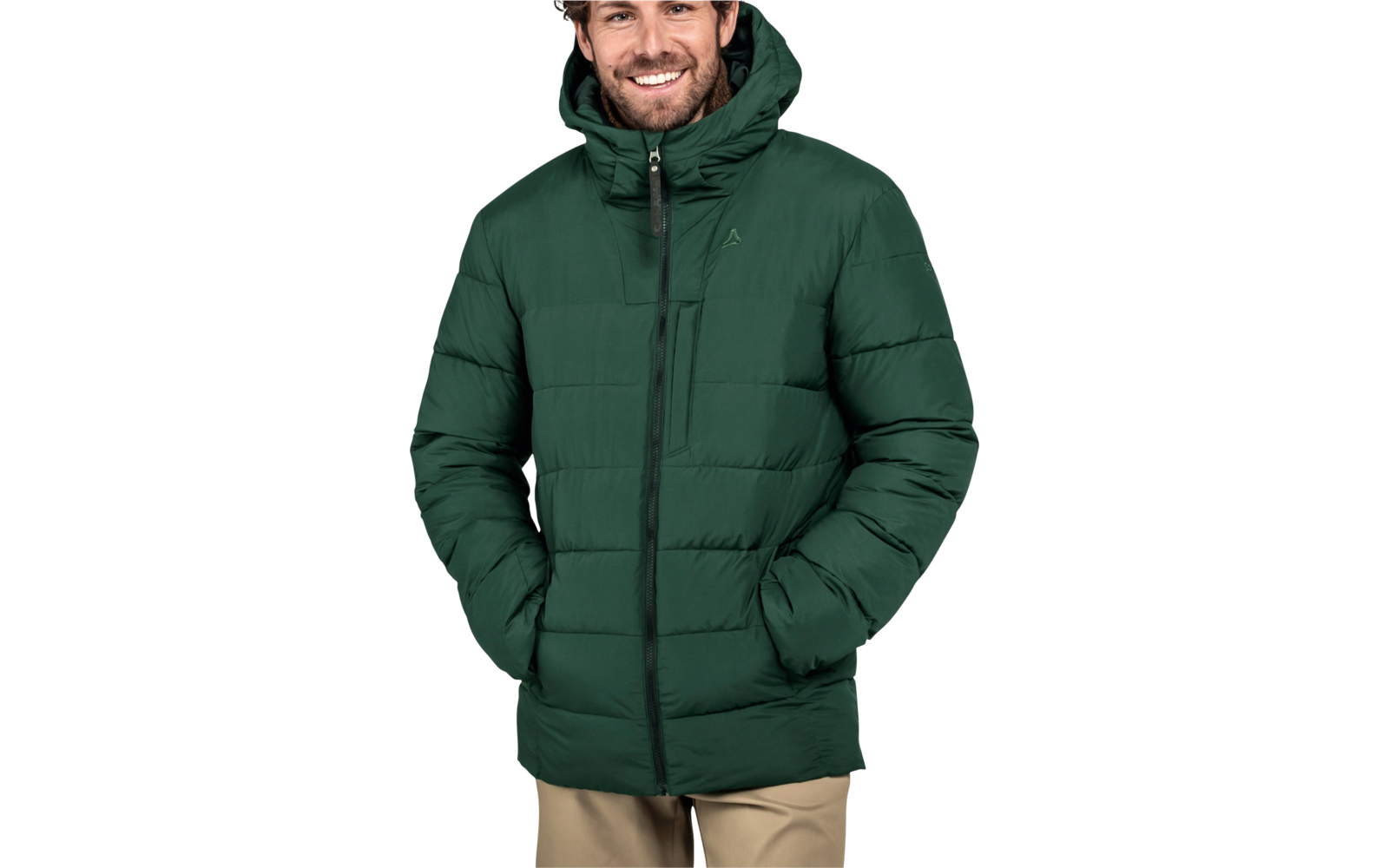 Man draagt groene winterjas en beige broek