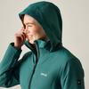 Person in profile, smiling with hand near face, wearing green hooded jacket with zipper and logo, light background