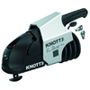 Silver-and-black trailer coupling with 'KNOTT' logo, black handle, black rubber bellows and two metal keys beside it
