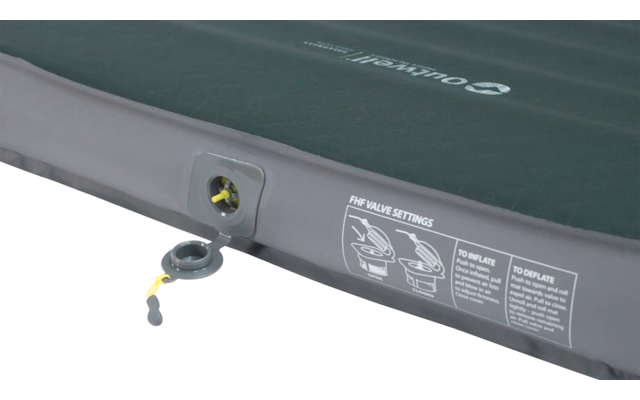 Detail van een grijze luchtmatras met ventiel en bedieningsinstructies