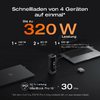 Schnellladen von vier Geräten gleichzeitig mit 320 Watt Leistung, gezeigt auf einem schwarzen Ladegerät mit orangener Schrift