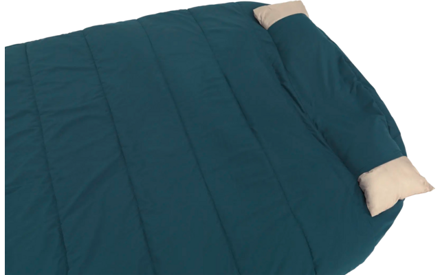 Blauer Schlafsack mit beigen Kopfpolstern