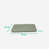Flaches rechteckiges hellgrau-grünes Polster mit Stoffoberfläche; grüne Maßpfeile mit Beschriftung '60 cm', '40 cm' und '2,5 cm'