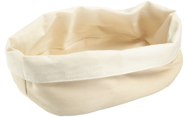 Empty rectangular cream-colored fabric object with folded top edge, soft sides and interior creases