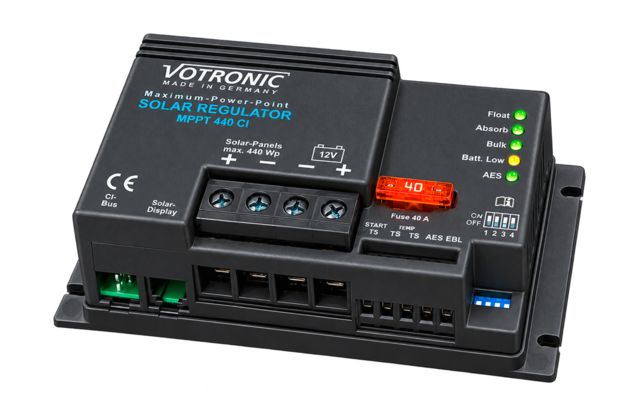 Black rectangular device with printed 'VOTRONIC', 'SOLAR REGULATOR MPPT 440 CI' and '12V'; four screw terminals, orange 40 A fuse, multiple green and yellow LED indicator lights, green sockets on the left, blue slide switch on the right, CE mark