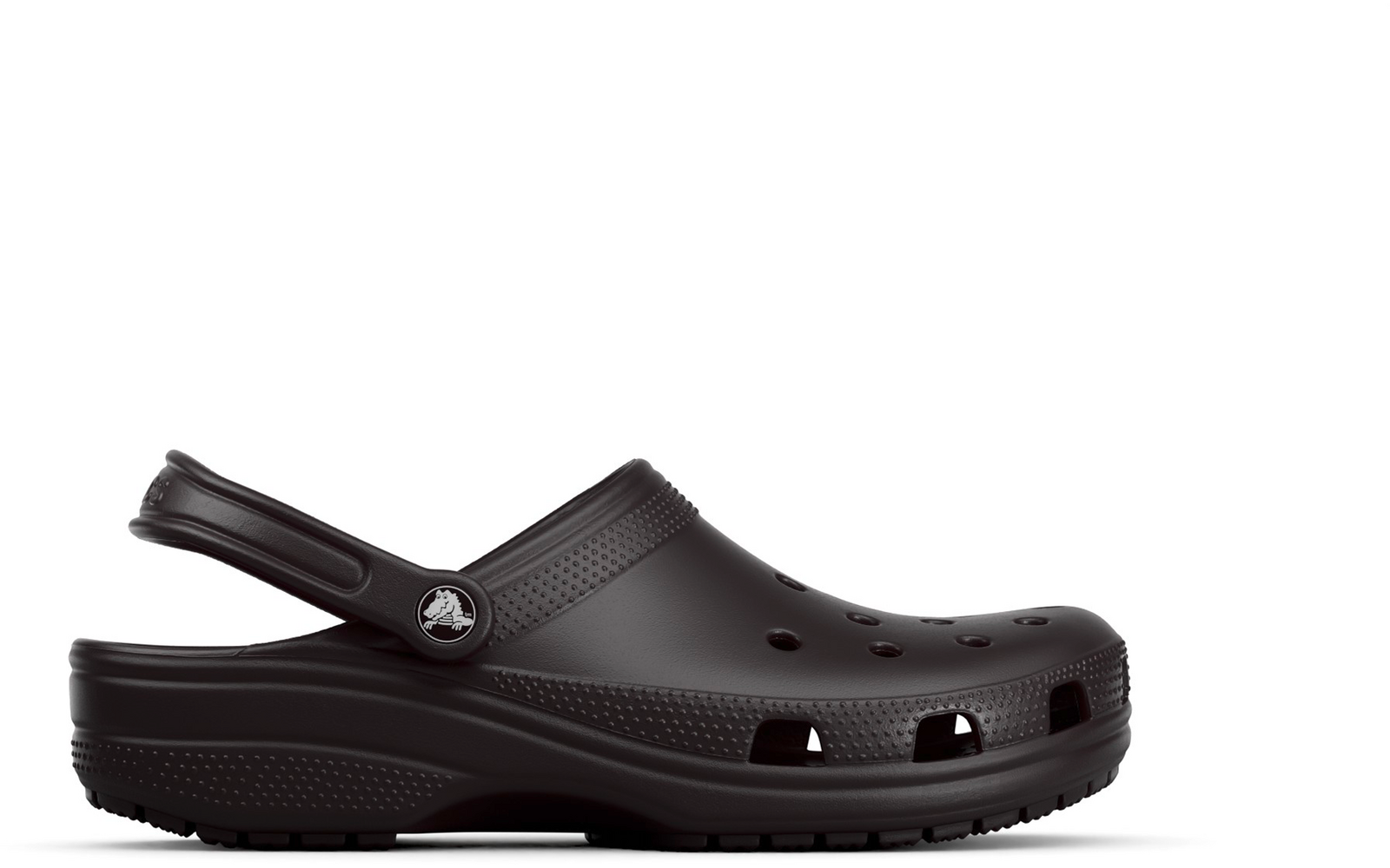 Schwarzer Clog mit Fersenriemen, Belüftungsöffnungen und profillierter Sohle, Seitenansicht auf weißem Hintergrund