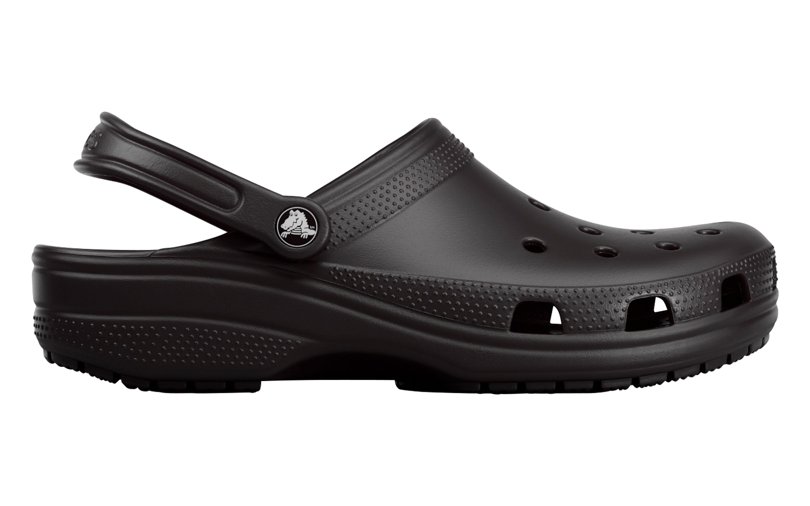 Schwarzer Clog mit Fersenriemen, Belüftungsöffnungen und profillierter Sohle, Seitenansicht auf weißem Hintergrund