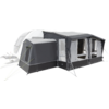 Een grijze moderne camper met een uitgeschoven luifel en een aangebouwde voortent