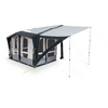Caravan with attached awning and sunshade