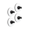 Four black hooks with white round suction cups on a white surface