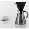 Coffee pot and coffee filter on white background