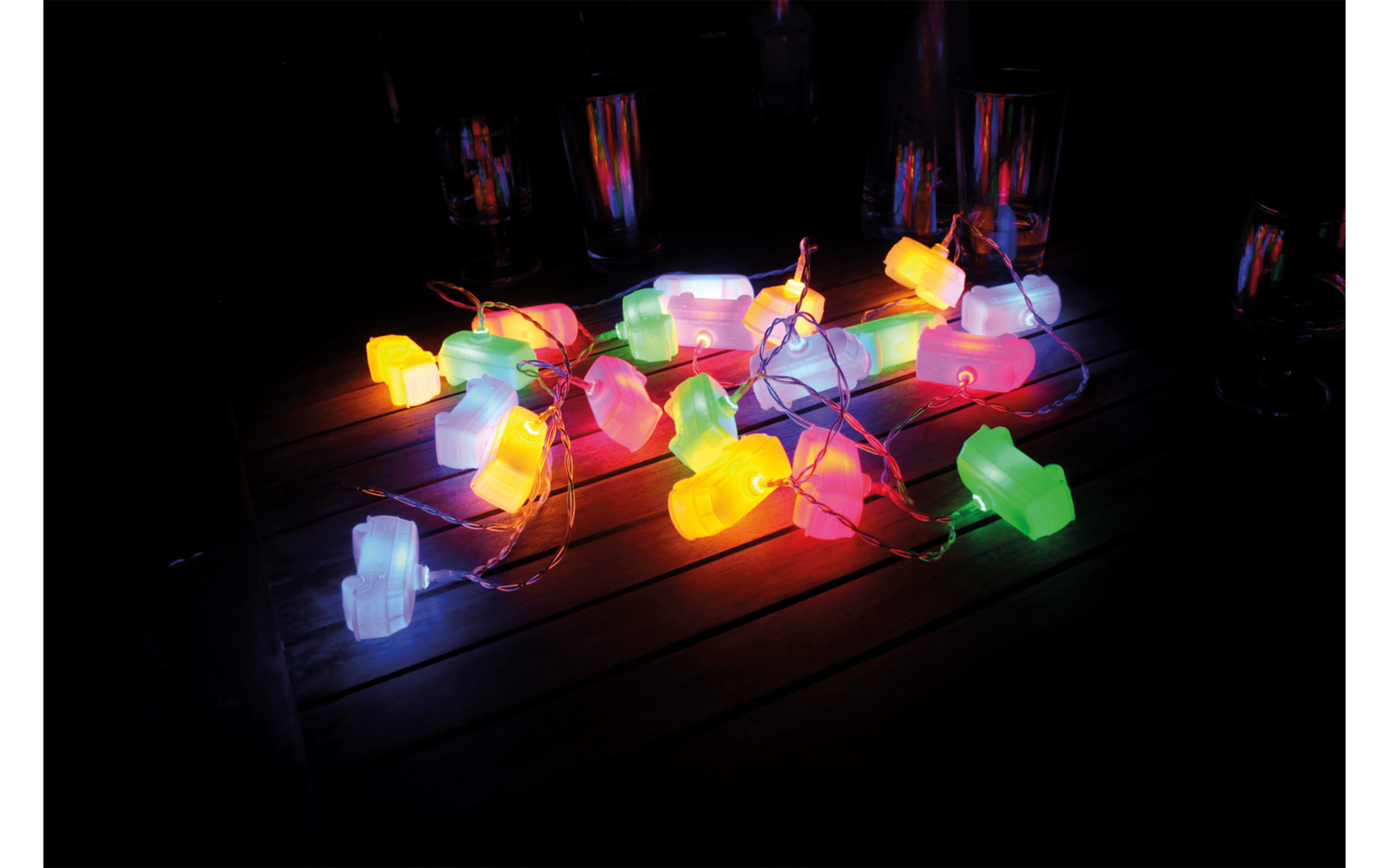 Bunte, leuchtende Objekte auf dunklem Hintergrund