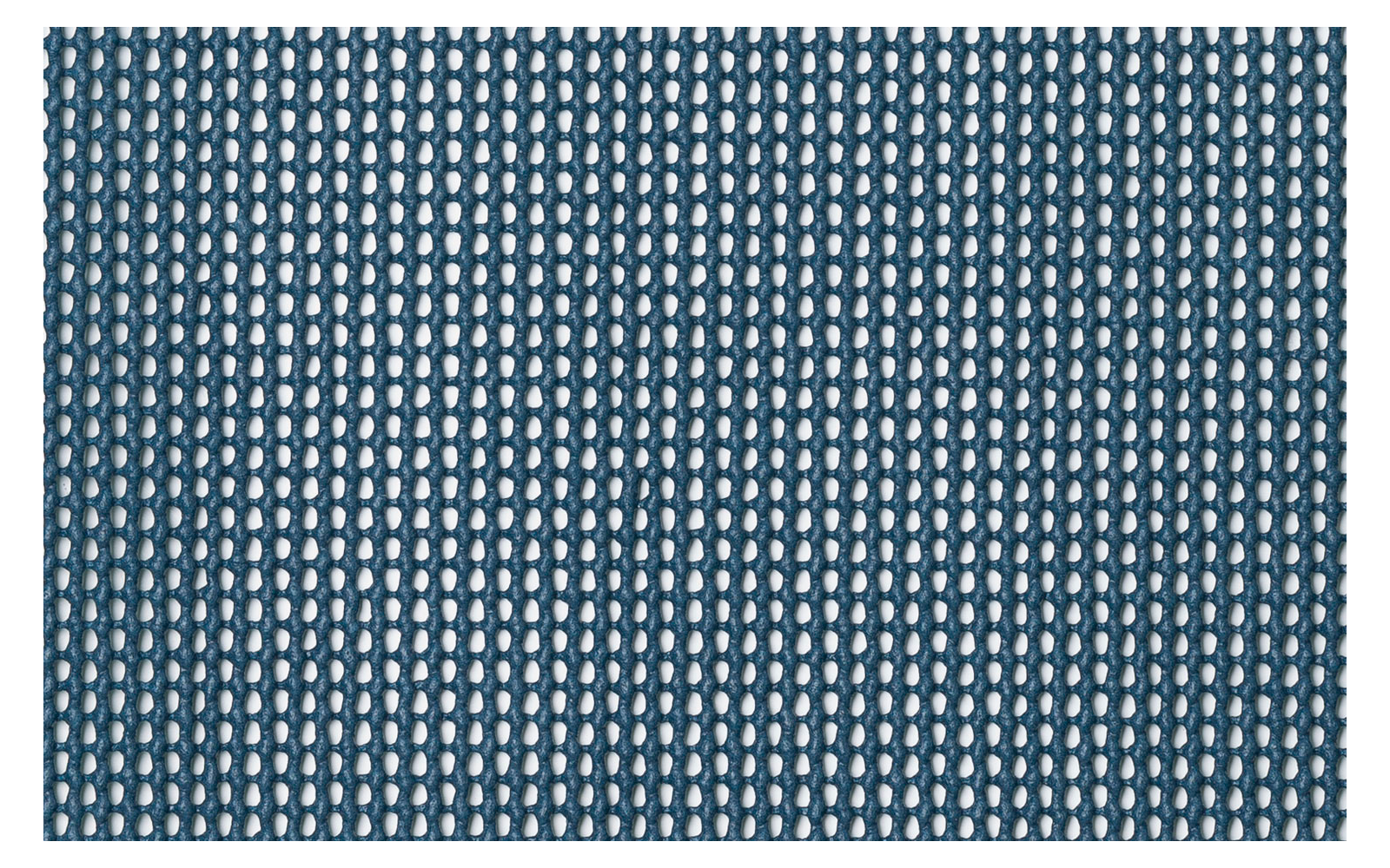 Close-up of perforated metal with evenly spaced round holes