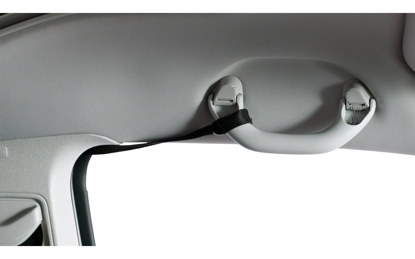 Innenseite eines Fahrzeugs mit Haltegriff am Dachhimmel über der Tür