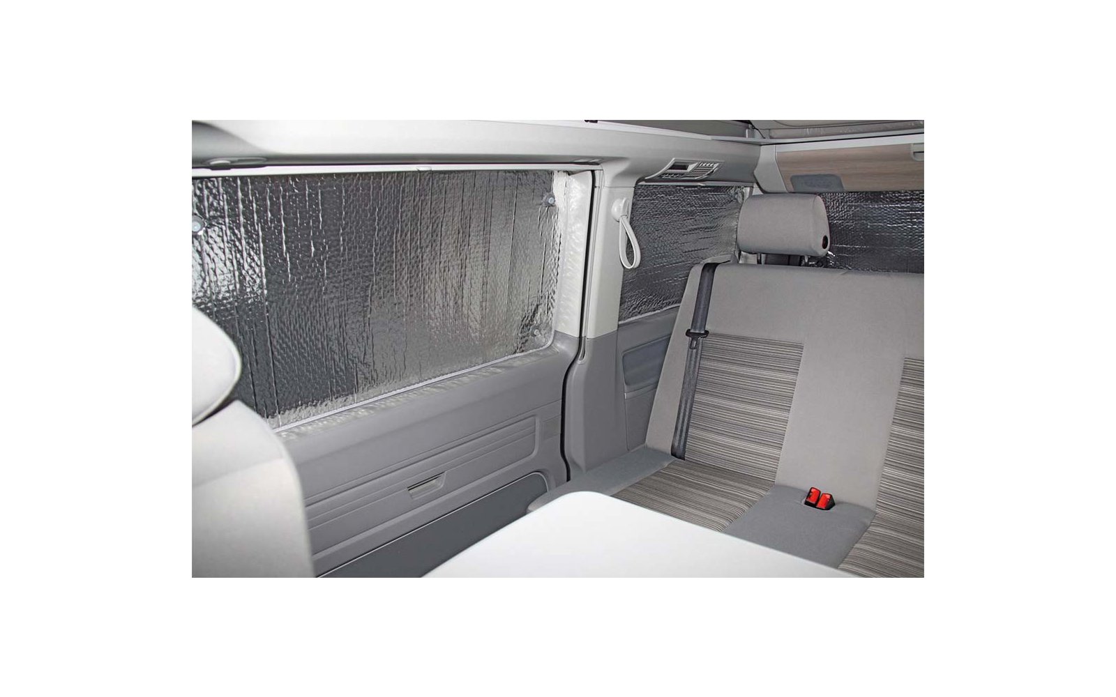 Interior of a car showing the back seat and a closed door