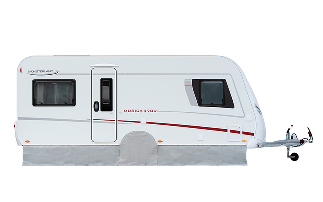 Weißes Reisemobil von der Seite mit Fenster und Fahrradträger vorne