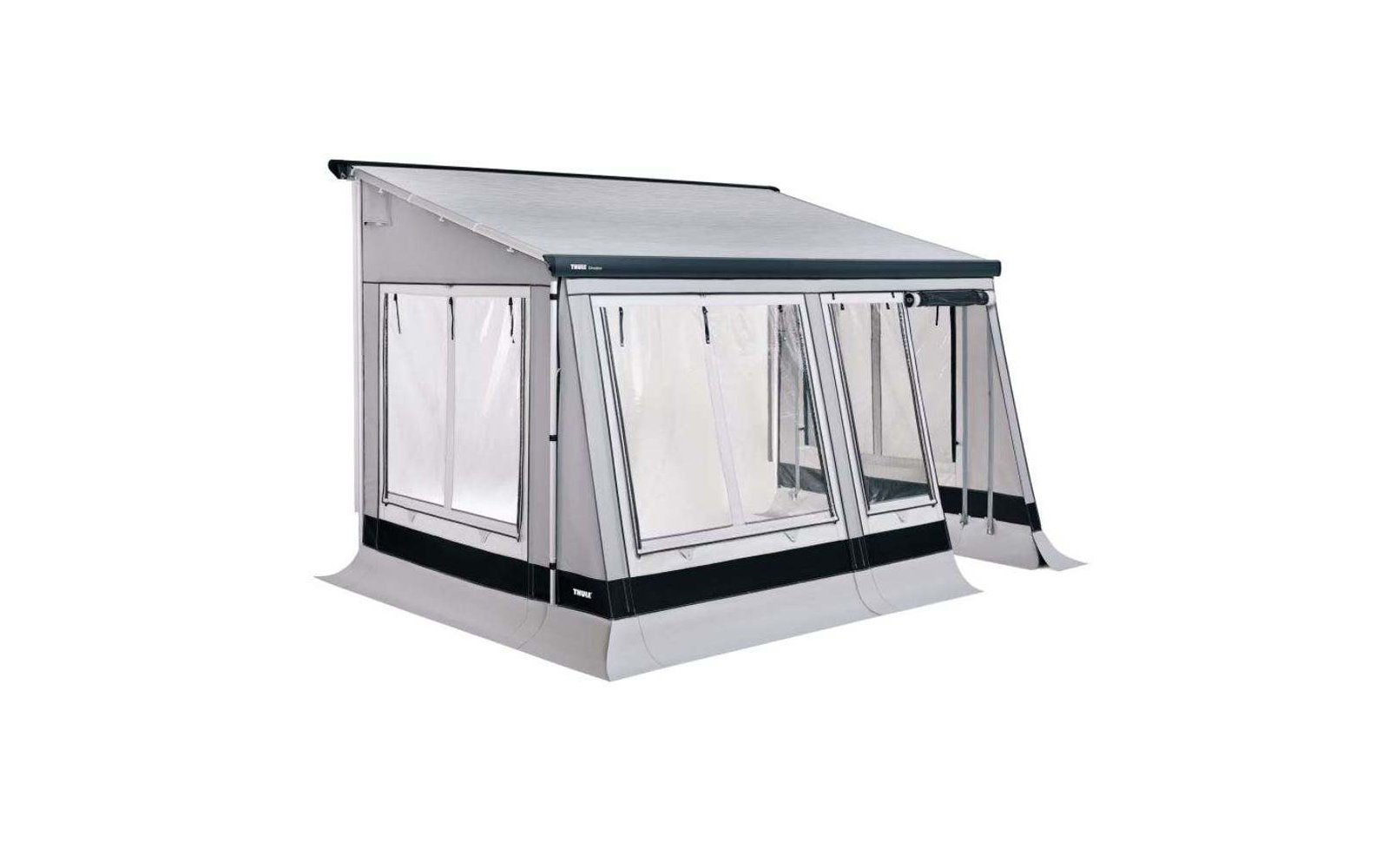 Auvent blanc et gris avec panneaux latéraux en plastique transparent fixé à une maison