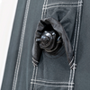 Close-up of a black fabric pouch with a drawstring and white stitching