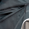 Closed black zipper on a fabric garment