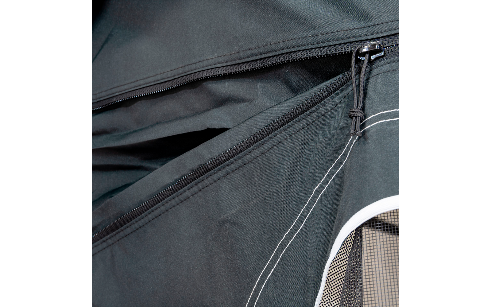 Closed black zipper on a fabric garment