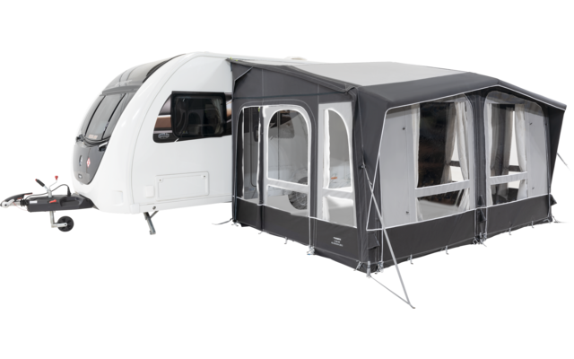 Caravan bianca con baldacchino grigio attaccato su sfondo bianco