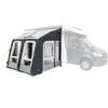 Witte camper met grijs voortent