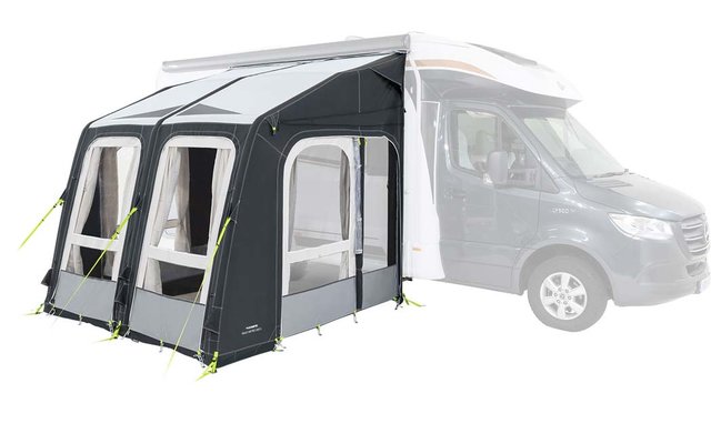 Witte camper met grijs voortent