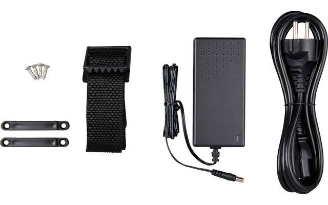 Electronic accessories including power adapter, cables and mounting clips on white background