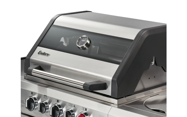 Closed stainless steel and black gas grill with control knobs in front