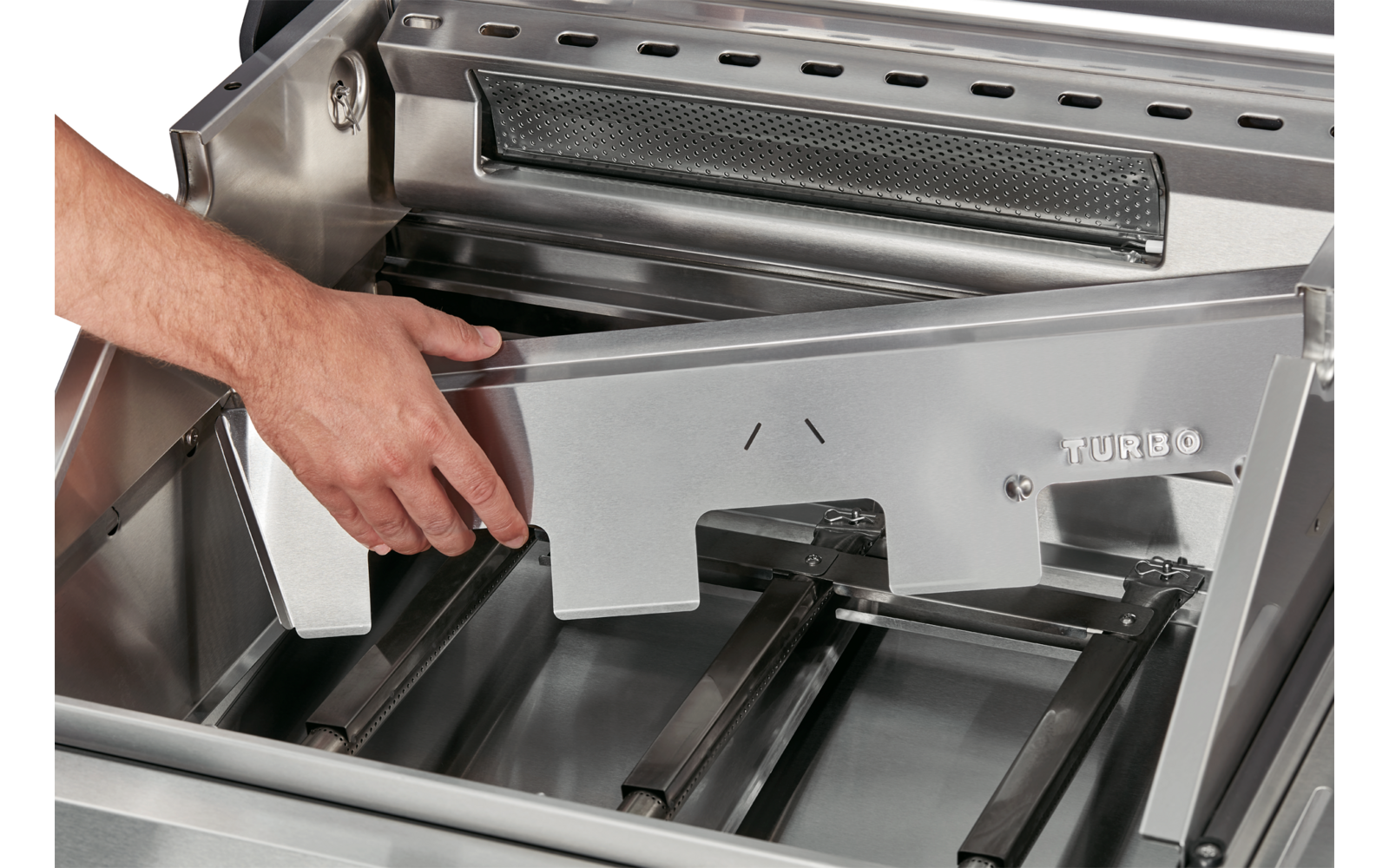 Hand opening a metallic drawer with multiple compartments