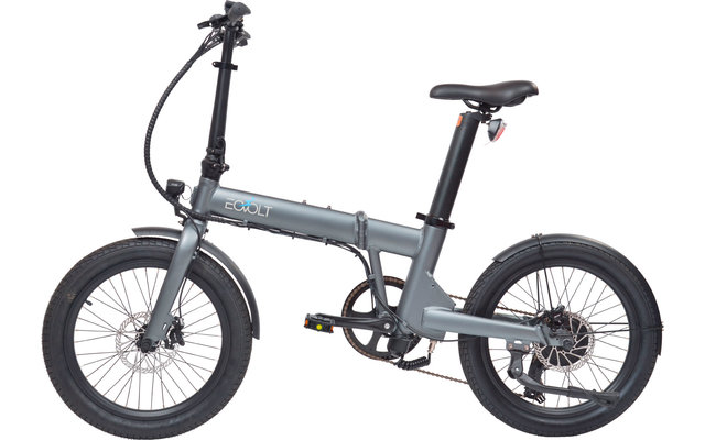 Kompaktes graues Klappfahrrad vor weißem Hintergrund