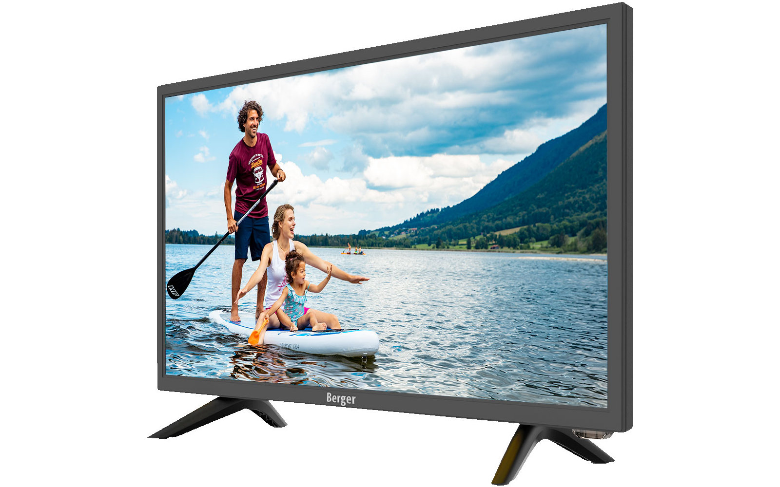 Eine schwarze Kathedrale mit hohen gotischen Fenstern und einer zweistufigen Spitze, umgeben von Bäumen unter blauem Himmel