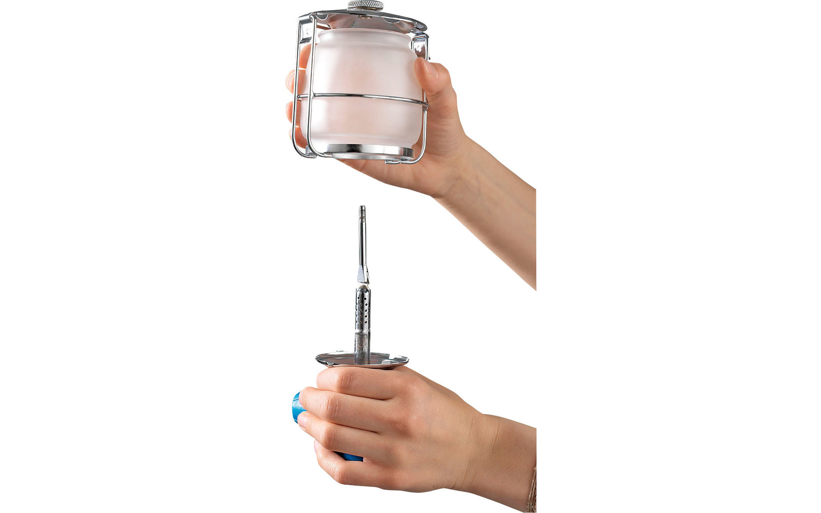 Hand holding a jar with white powder and another hand holding a plunger above it
