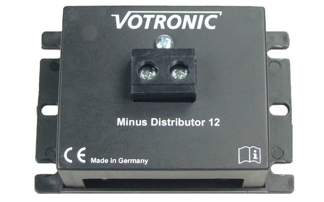Zwart elektronisch apparaat met het label VOTRONIC en Minus Distributor 12