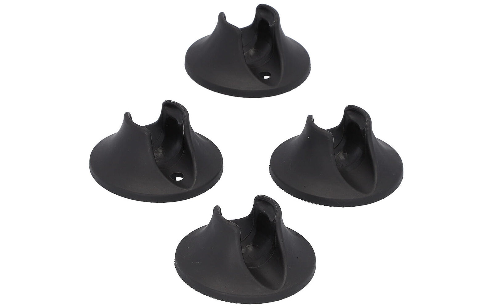 Cuatro posavasos redondos negros con soportes elevados
