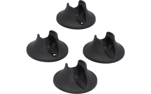 Cuatro posavasos redondos negros con soportes elevados